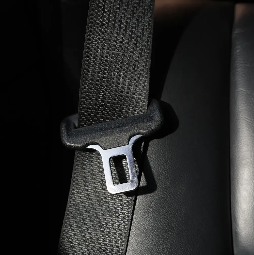 Retractor Systems — product image showing seat belt webbing and hardware